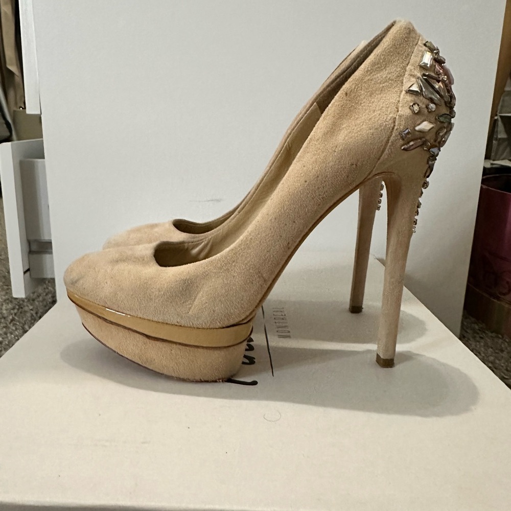 Brian Atwood pumps in fair condition.
